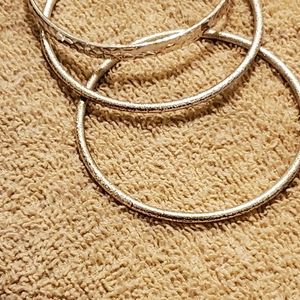 Silver tone bangles